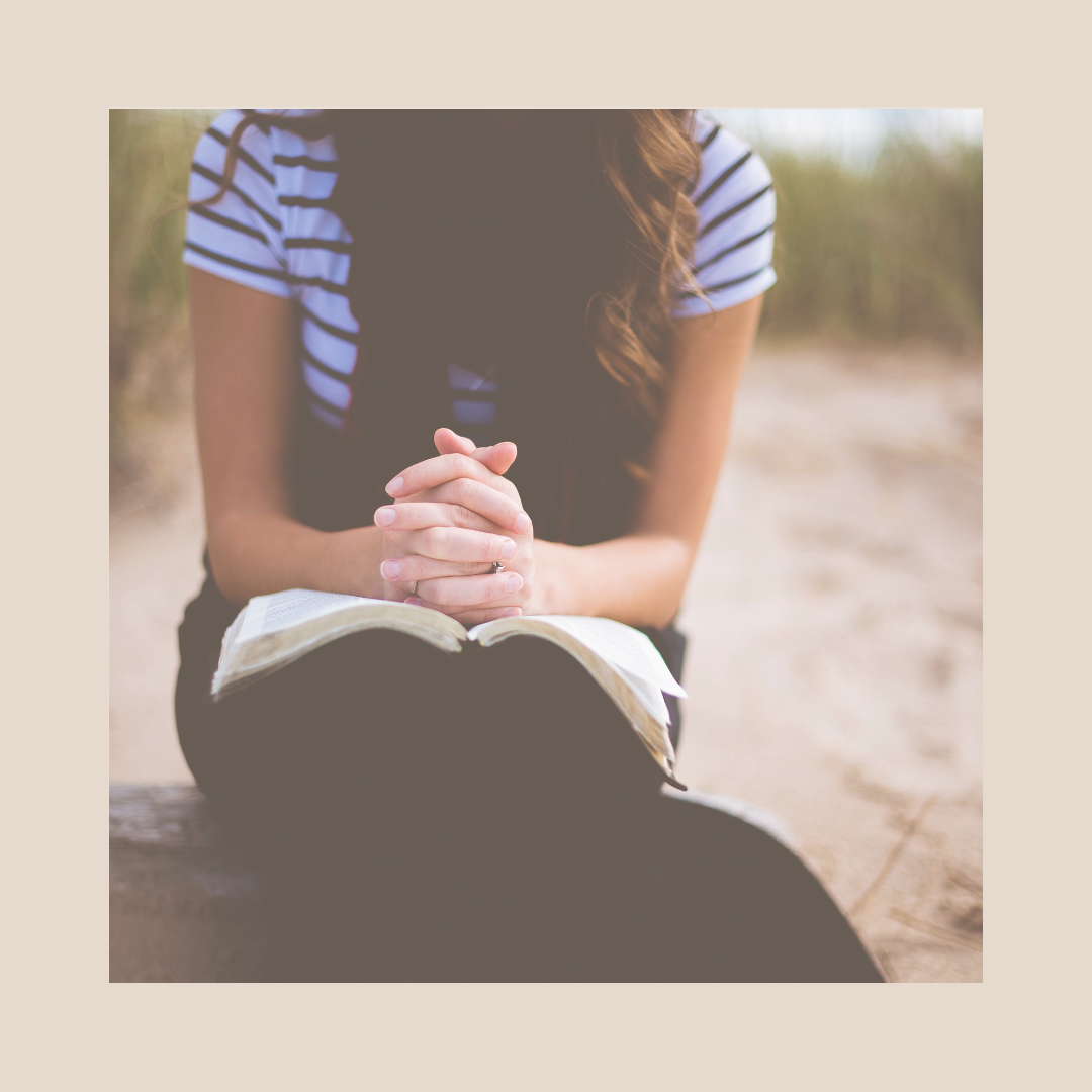 Christian entrepreneur reflecting and praying over her business, choosing to overcome hustle culture by building a sustainable, Spirit-led business God's way.